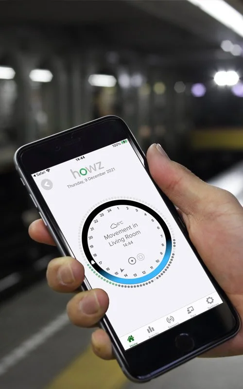 App screen seen on phone held by a person in the subway